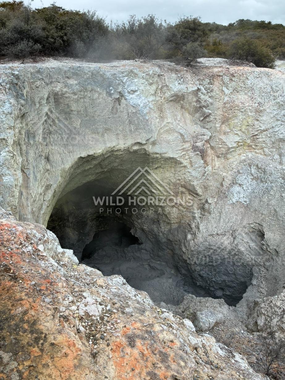 Steam Rising From a Geothermal Cavern. Wai-O-Tapu, Rotorua, New Zealand