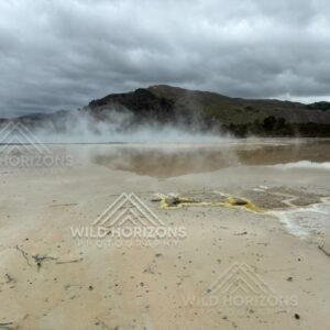 Mist Drifting Across a Geothermal Pool. Wai-O-Tapu, Rotorua, New Zealand