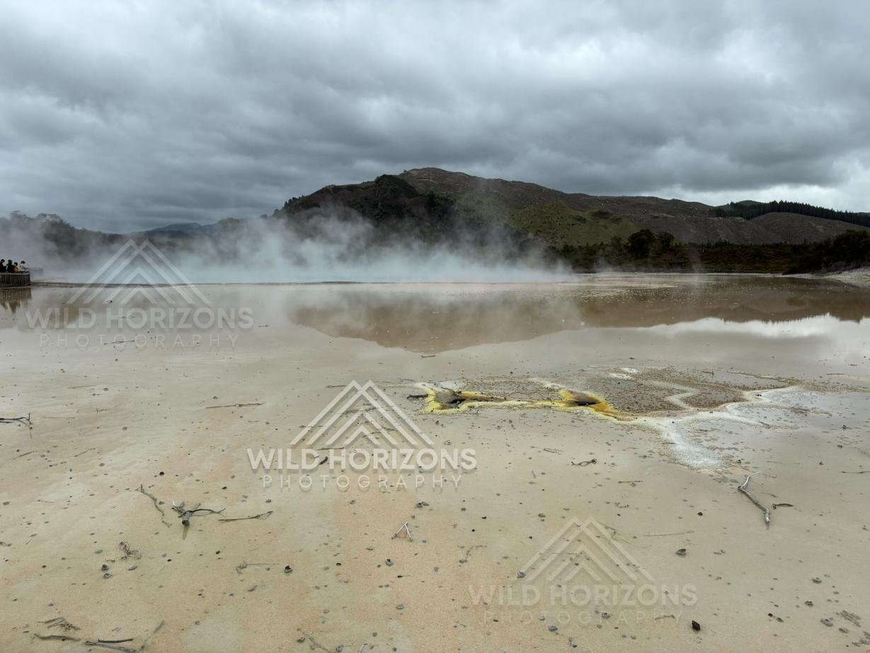 Mist Drifting Across a Geothermal Pool. Wai-O-Tapu, Rotorua, New Zealand