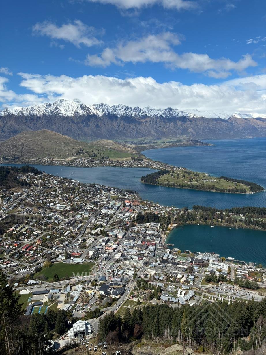 Expansive alpine panorama overlooking Queenstown and Lake Wakatipu. Queenstown, New Zealand