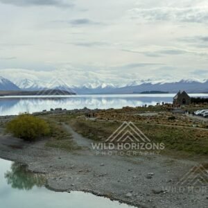Church of the Good Shepherd overlooking a reflective alpine lake. Lake Tekapo, New Zealand