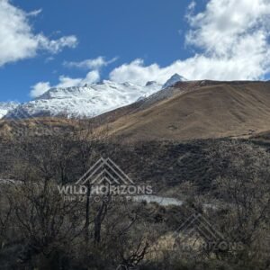 Snow-Dusted Southern Alps Above Dry Hills, New Zealand