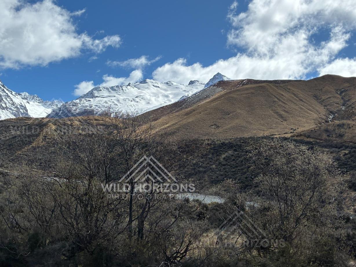 Snow-Dusted Southern Alps Above Dry Hills, New Zealand