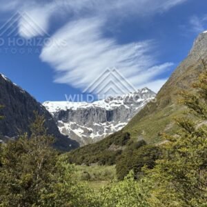 Mountain Valley and Snow-Capped Peaks on Milford Road New Zealand
