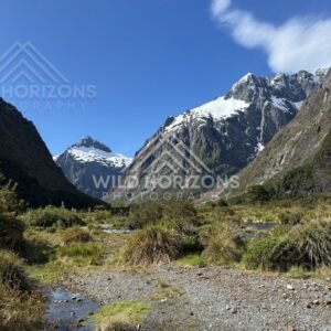 Braided Stream Flats Below Snowy Fiordland Peaks, Milford Road, New Zealand