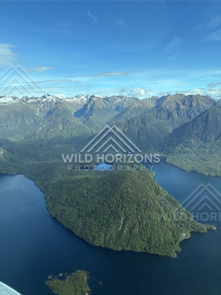 Aerial View of Forested Peninsula in Fiordland Lake, Fiordland, New Zealand
