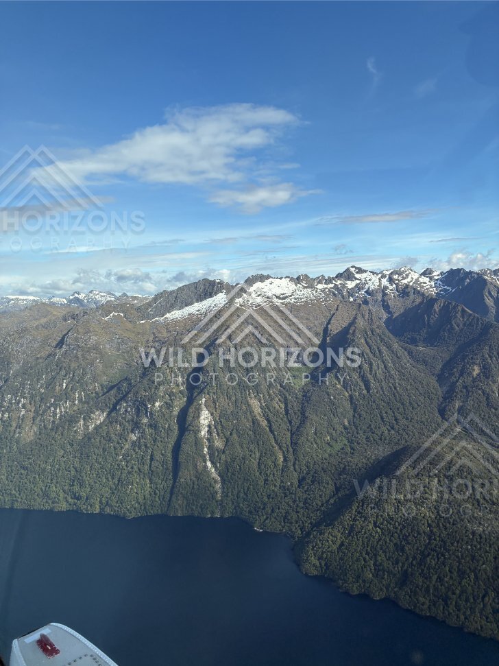 Snow-Edged Mountain Ridge Above Fiordland Lake, Fiordland, New Zealand