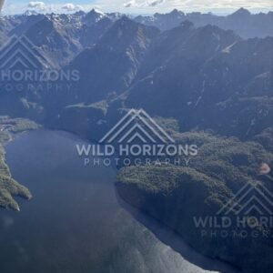 Seaplane Window View Over a Fiordland Lake and Mountain Walls, Fiordland National Park, New Zealand
