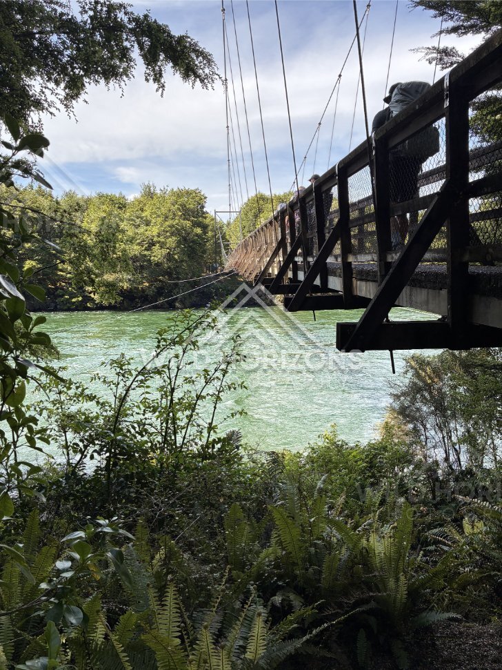Suspension Footbridge Over River Near Manapouri New Zealand