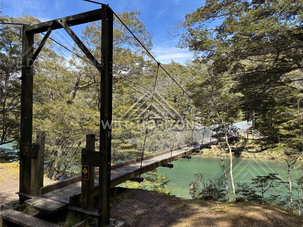 Suspension Footbridge Over Turquoise Water at Mavora Lakes New Zealand