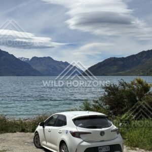Parked Car Beside Lake Wakatipu Under Lenticular Clouds, Kingston, New Zealand