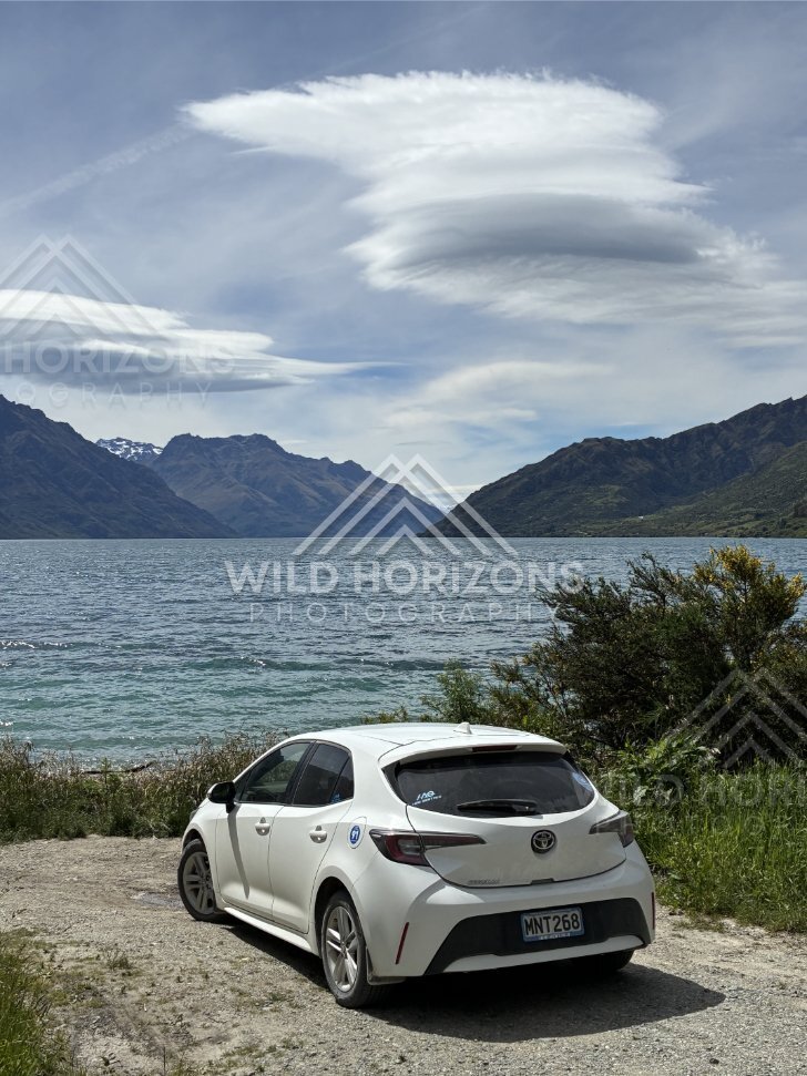 Parked Car Beside Lake Wakatipu Under Lenticular Clouds, Kingston, New Zealand