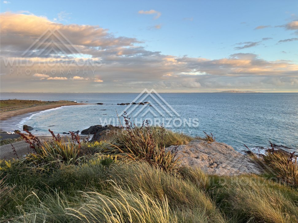 Coastal Clifftop Lookout Over a Crescent Bay and Calm Blue Water. Riverton, New Zealand