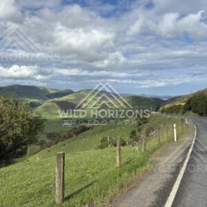 Winding Coastal Road Through Green Hills, The Catlins, New Zealand