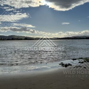 Sunbeams Over Estuary Water and Sand, Surat Bay, New Zealand