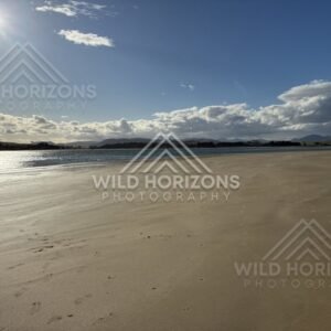 Empty Beach With Sun Glare on Wet Sand, Surat Bay, New Zealand