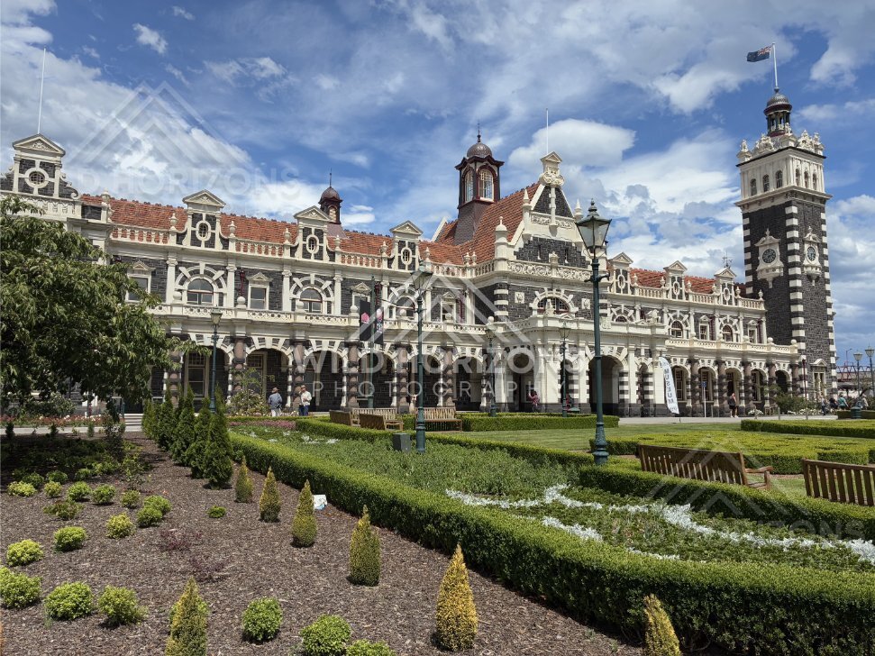 Remote Coastal Road and Open Shoreline, Dunedin Railway Station, New Zealand