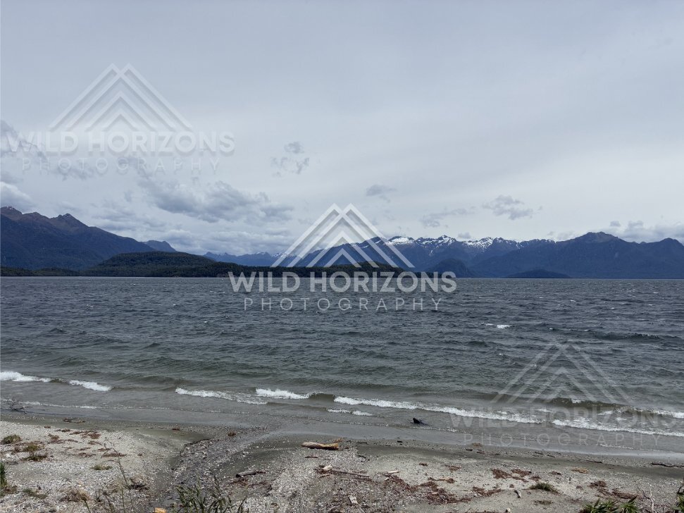 Wind-Rippled Lake and Mountain Backdrop, Lake Manapouri, New Zealand