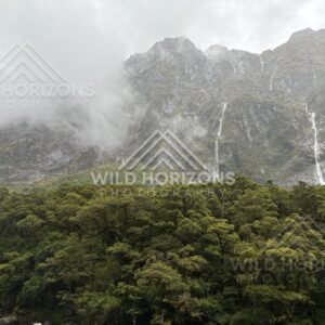 Misty Valley Layers With a Distant Mountain Waterfall, Milford Road, New Zealand