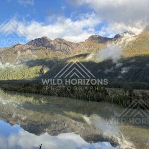 Sunlit Slopes Reflected in Mirror Lakes, Milford Road, New Zealand