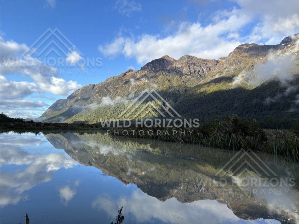 Wide Mirror Lakes Landscape with Dramatic Cloud, Milford Road, New Zealand