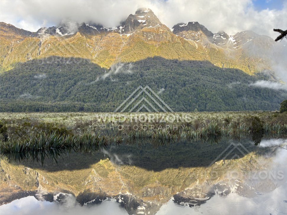 Jagged Ridgeline Reflected Across Mirror Lakes, Milford Road, New Zealand