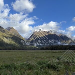 Cloud-draped mountain slopes beside the Milford Road, New Zealand