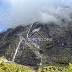 Fiordland Buttress Waterfalls with Cloud and Snow, Milford Road, Fiordland National Park, New Zealand