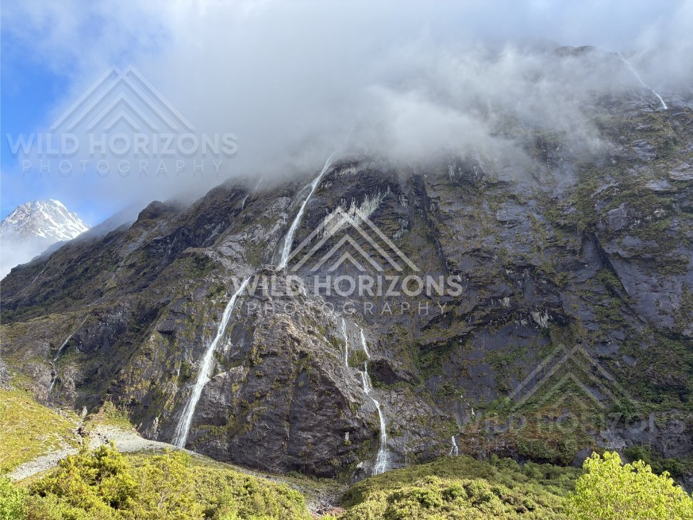 Fiordland Buttress Waterfalls with Cloud and Snow, Milford Road, Fiordland National Park, New Zealand
