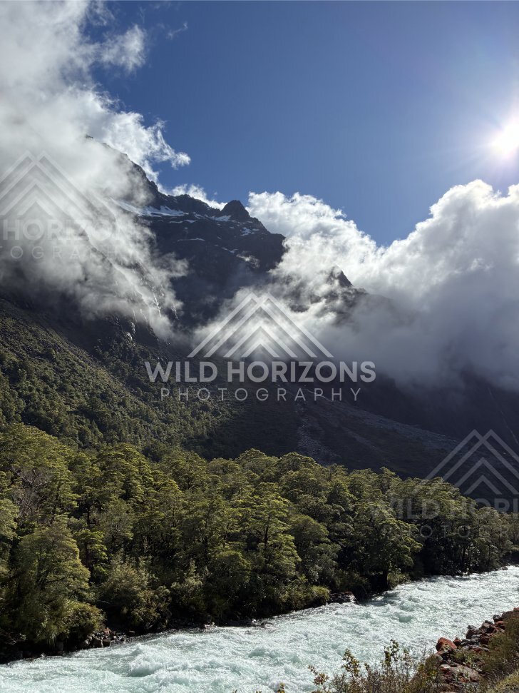 Turquoise River Rapids beneath Cloudy Alpine Peaks, Milford Road, Fiordland National Park, New Zealand
