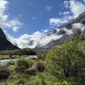 Fiordland Valley River with Low Cloud on Granite Slopes, Milford Road, Fiordland National Park, New Zealand