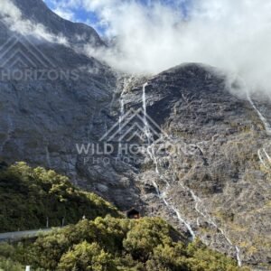 Roadside View of Post-Rain Waterfalls near the Homer Tunnel, Milford Road, Fiordland National Park, New Zealand