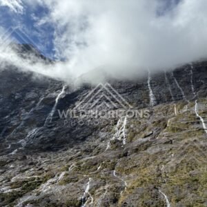 Low Cloud Rolling Over Waterfall-Streaked Mountain Slopes, Milford Road, Fiordland National Park, New Zealand