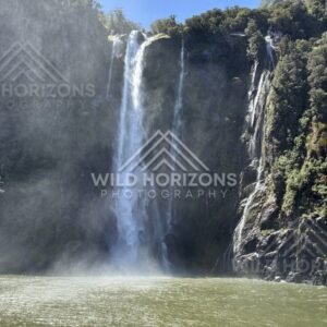 Waterfall and cliffside cascades, Milford Sound, New Zealand