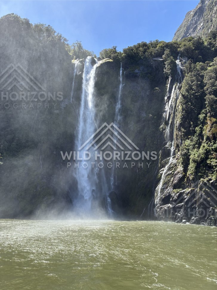 Waterfall and cliffside cascades, Milford Sound, New Zealand