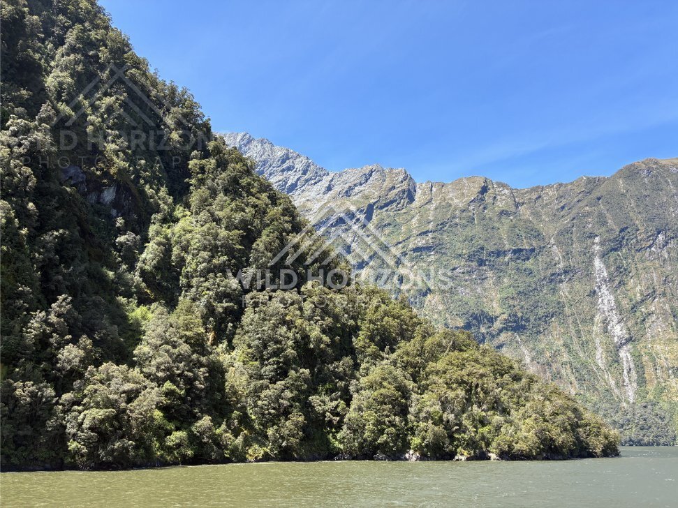 Mountain wall with a thin waterfall streak, Milford Sound, New Zealand