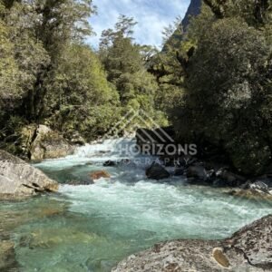 Shallow Glacial Pool Beside Rushing Channel. New Zealand