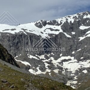 Snow-Streaked Mountain Face on Milford Road New Zealand
