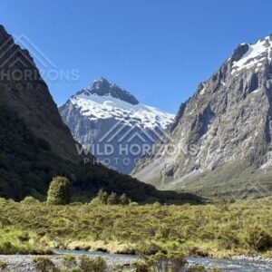 River Flats and Mountain Peaks Along Milford Road New Zealand
