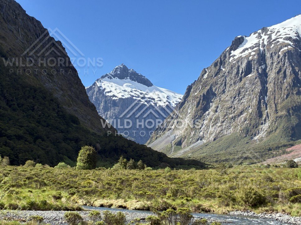 River Flats and Mountain Peaks Along Milford Road New Zealand