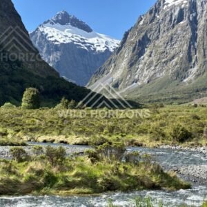 Green Valley and Sheer Peaks on Milford Road New Zealand