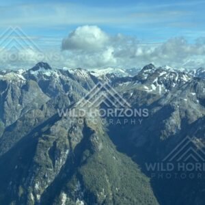 Snow-Dusted Peaks and Fiordland Valleys. Fiordland, New Zealand.
