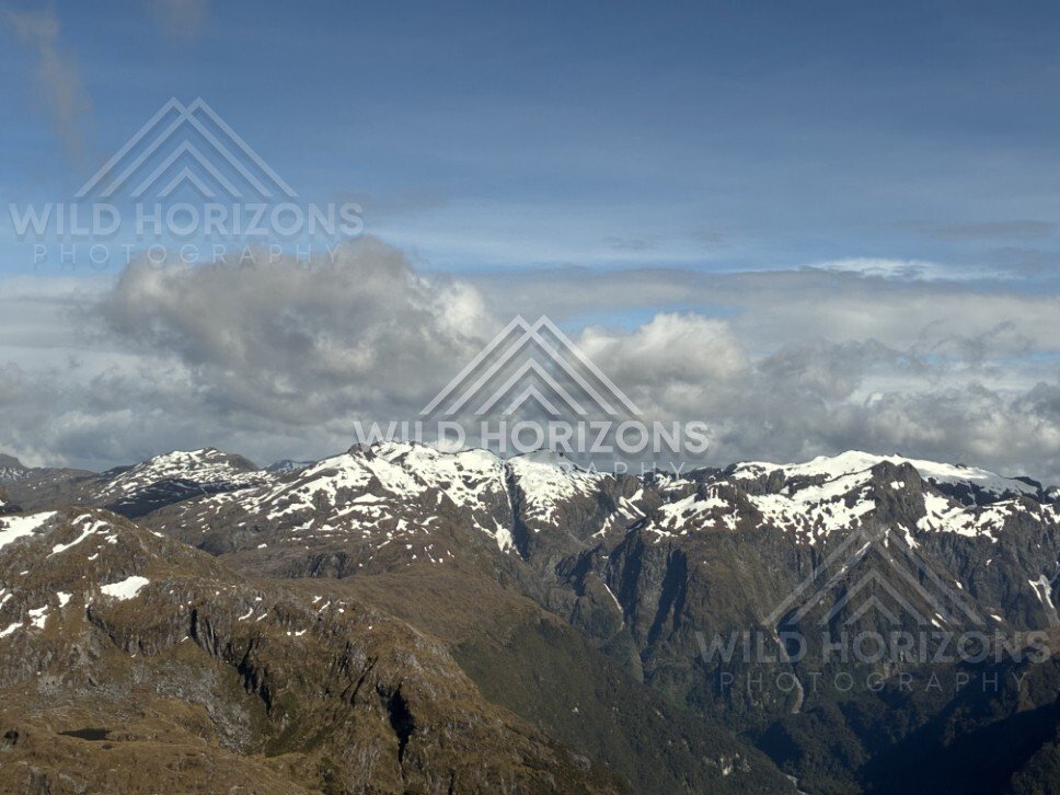 Cloud Shadows Over Fiordland Peaks. Fiordland, New Zealand.