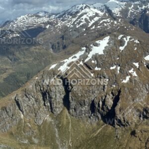 Jagged Fiordland Peaks and Snow Patches. Fiordland, New Zealand.