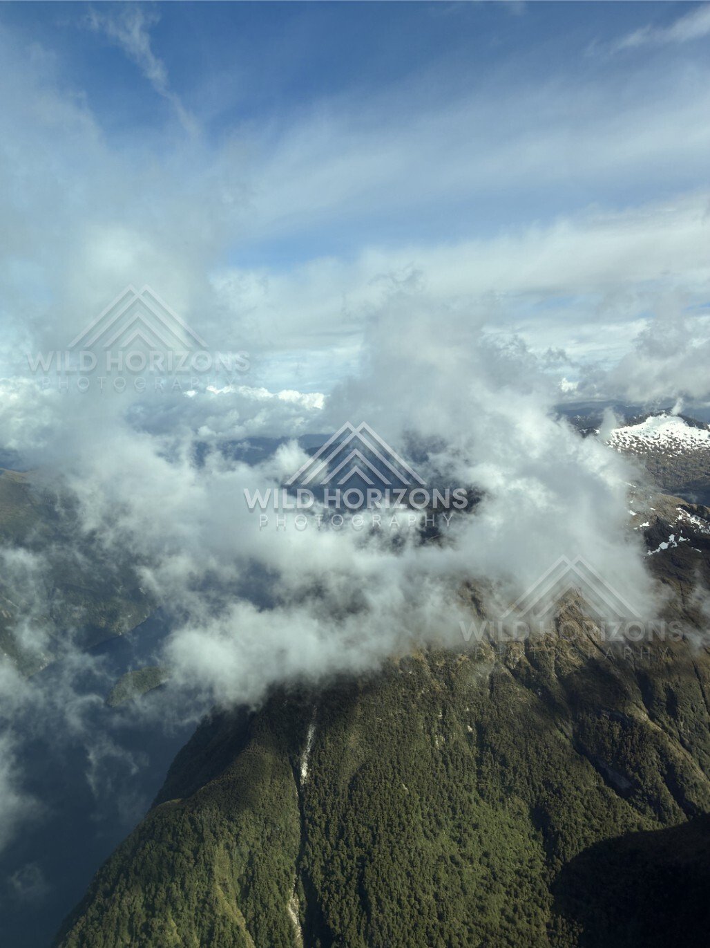 Cloud Layer Over Fiordland Ranges. Fiordland, New Zealand.