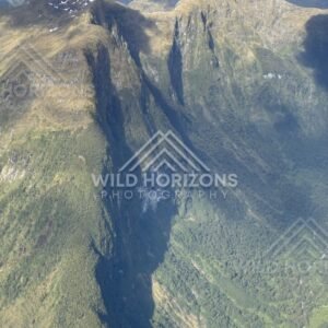 Deep Fiordland Valley and Sheer Slopes. Fiordland, New Zealand.