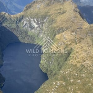Remote Fiordland Lake Surrounded by Mountains. Fiordland, New Zealand.
