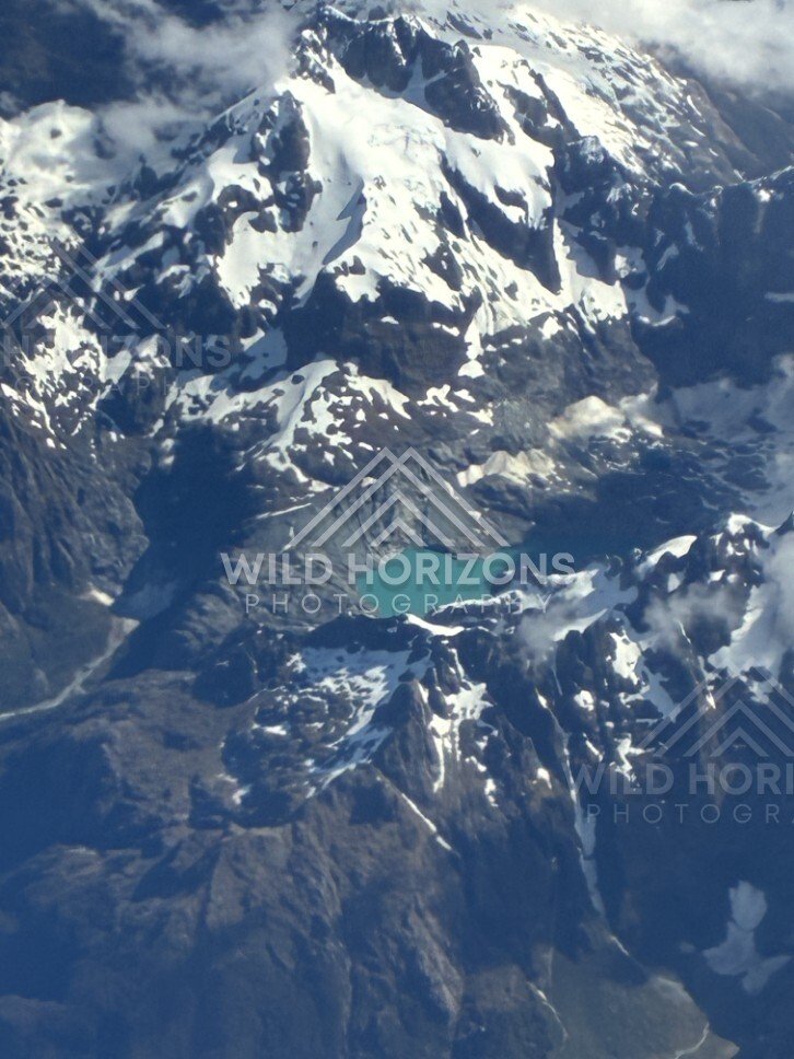 Glacial valleys and alpine ridges seen from above. Queenstown, New Zealand.