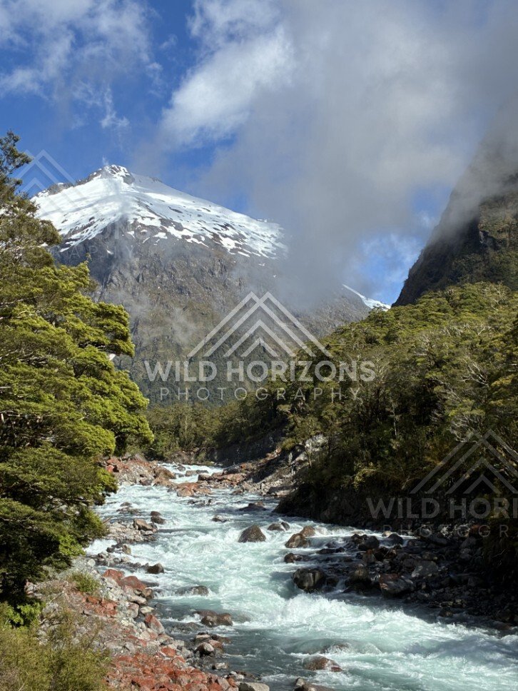 Long Diagonal Waterfall Across a Steep Mountainside. Milford Road, New Zealand.
