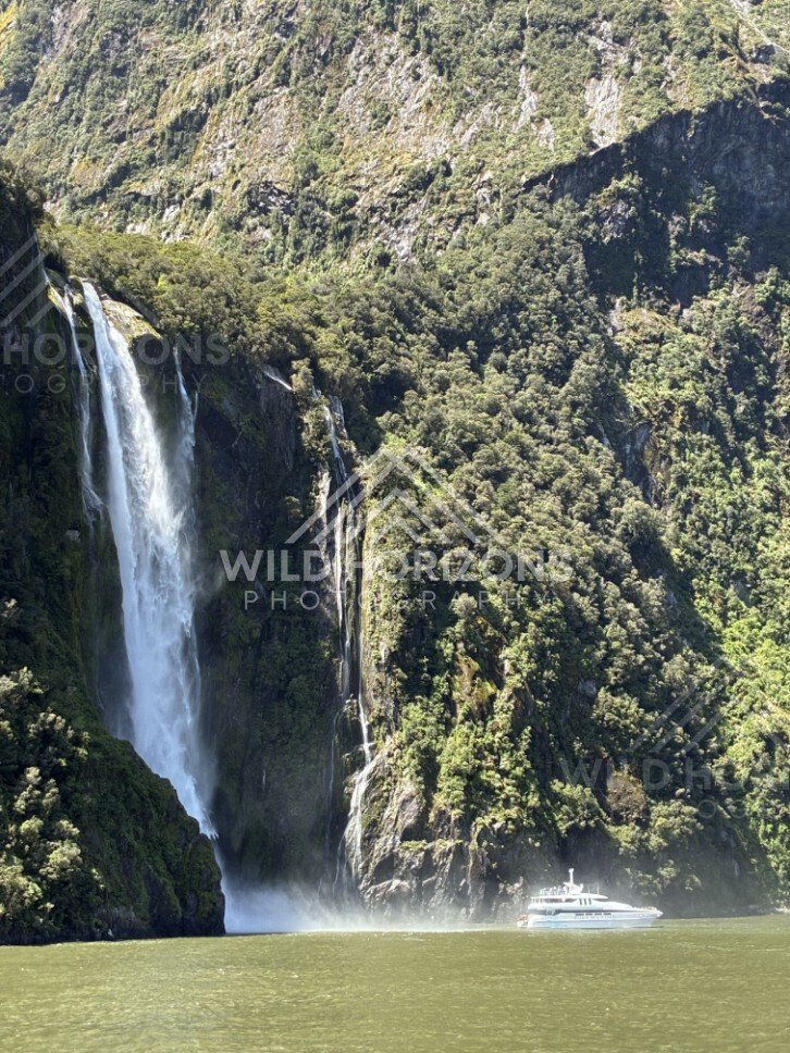 Stirling Falls Pouring Down a Steep Forested Slope. Milford Sound, New Zealand.